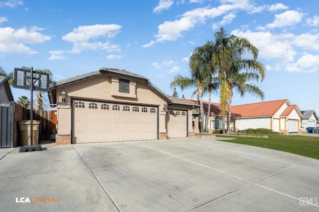 ranch-style home featuring a garage