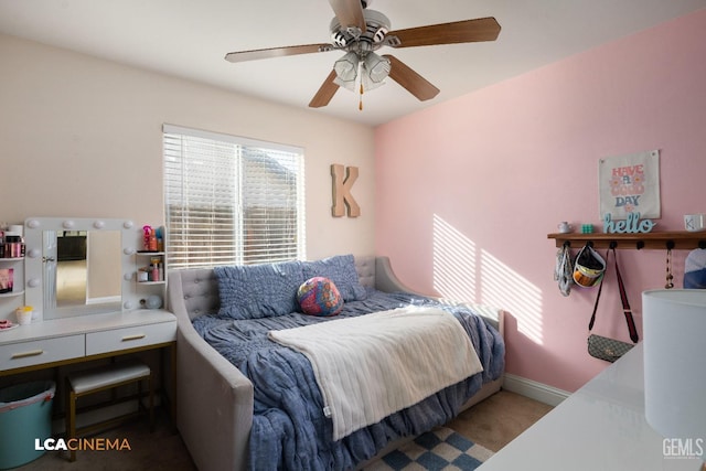 carpeted bedroom with ceiling fan