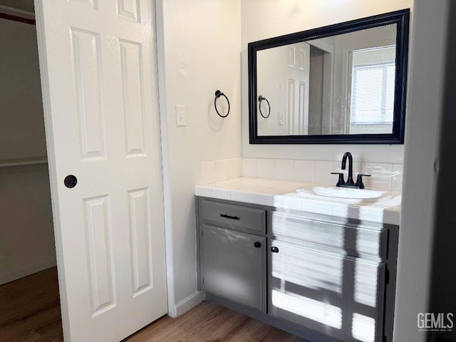 5717 Arc Dome Ave, Bakersfield, CA 93313 - bathroom featuring vanity and wood finished floors