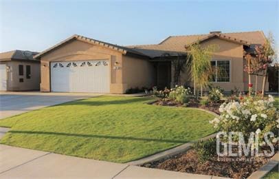 704 Candia Ave, Bakersfield, CA 93307 - ranch-style house with an attached garage, driveway, a front yard, and stucco siding