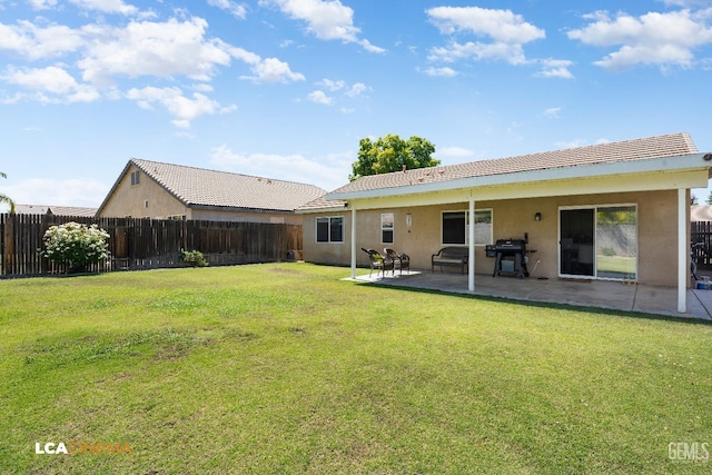 10006 Grand View Summit Dr, Bakersfield, CA 93311 - back of house with stucco siding, a fenced backyard, a patio area, and a tiled roof