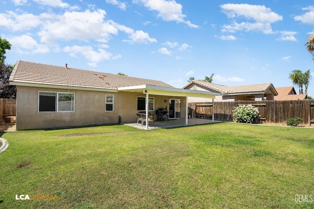 10006 Grand View Summit Dr, Bakersfield, CA 93311 - rear view of house with stucco siding, a fenced backyard, a patio area, and a tile roof