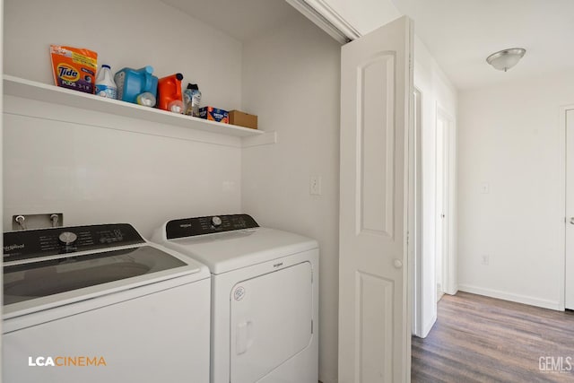 10006 Grand View Summit Dr, Bakersfield, CA 93311 - laundry room featuring washer and dryer and wood finished floors