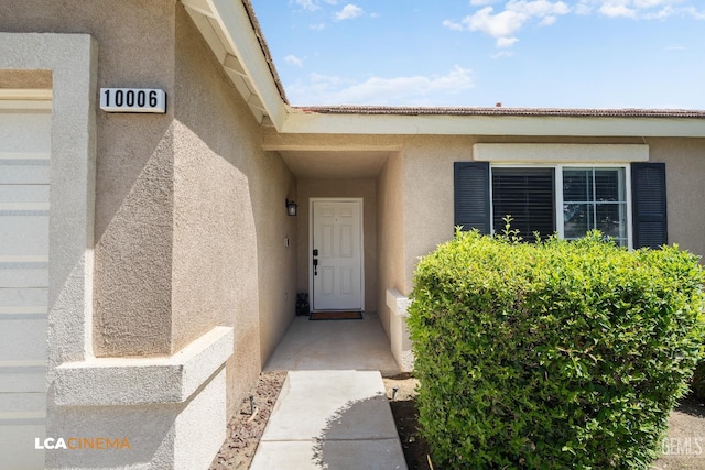 10006 Grand View Summit Dr, Bakersfield, CA 93311 - view of exterior entry with stucco siding