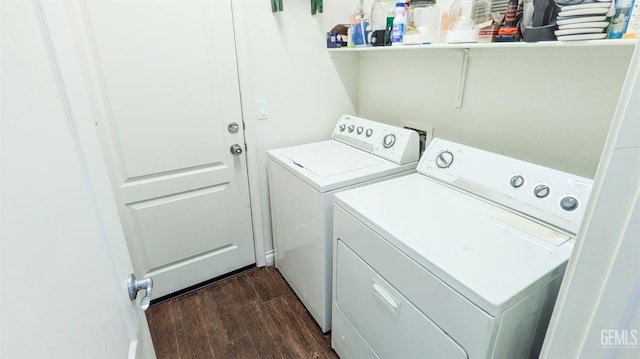 laundry area featuring laundry area, separate washer and dryer, and dark wood-style floors