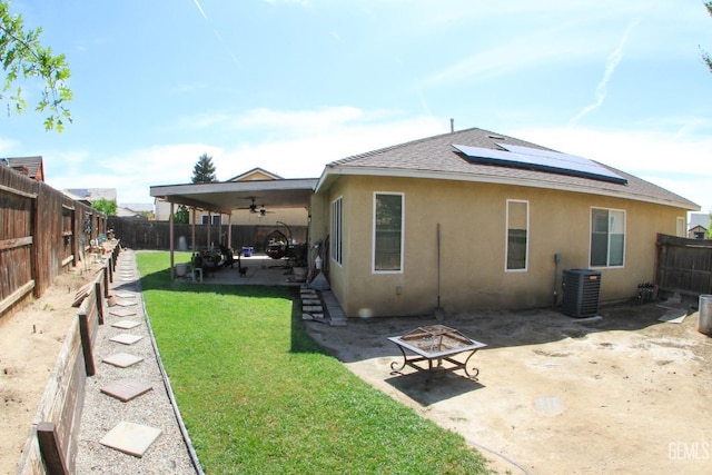 back of property featuring a patio area, a fenced backyard, stucco siding, and central air condition unit