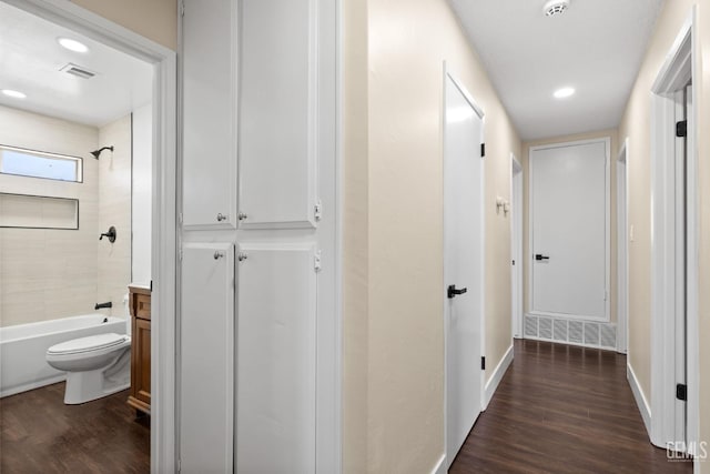 2605 Bladen St, Bakersfield, CA 93309 - corridor featuring dark wood-style flooring and recessed lighting