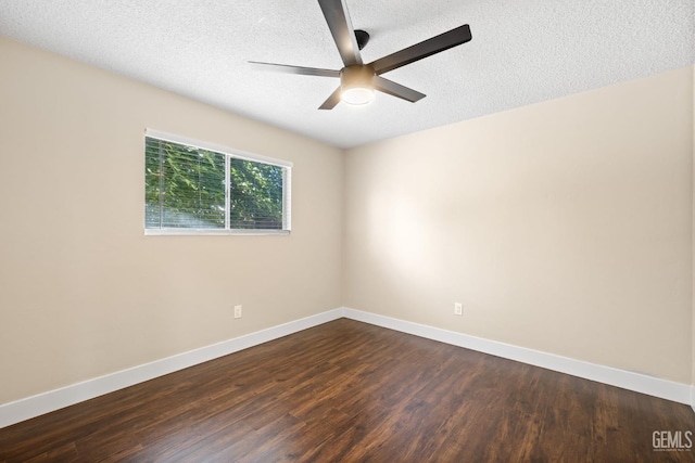 2605 Bladen St, Bakersfield, CA 93309 - unfurnished room with a ceiling fan, dark wood-style floors, and a textured ceiling