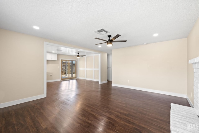 2605 Bladen St, Bakersfield, CA 93309 - unfurnished living room featuring a ceiling fan, dark wood finished floors, recessed lighting, and a textured ceiling