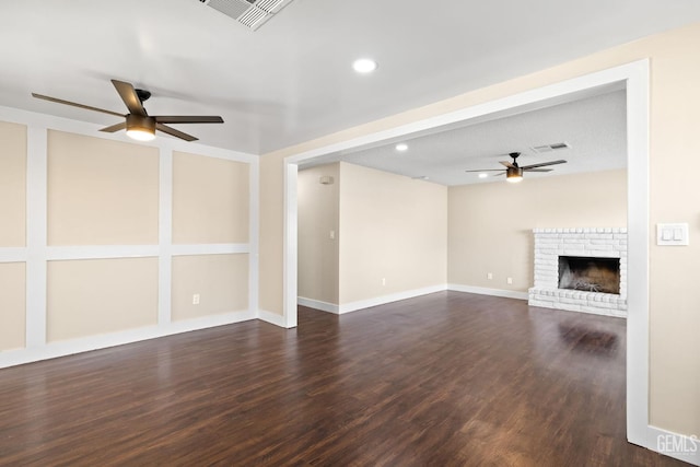 2605 Bladen St, Bakersfield, CA 93309 - unfurnished living room with ceiling fan, dark wood finished floors, a fireplace, and recessed lighting