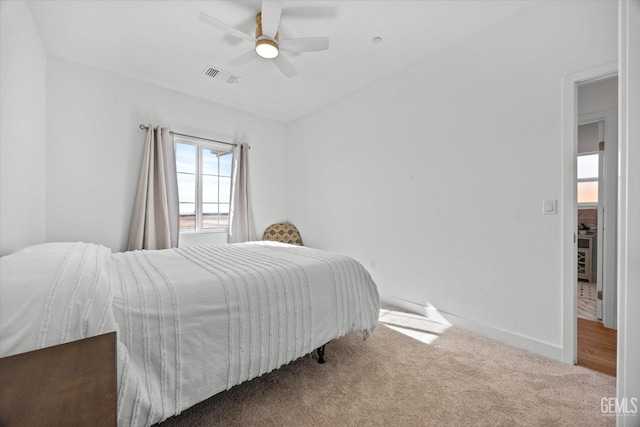 bedroom featuring carpet and ceiling fan