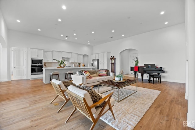 living room featuring light wood-type flooring