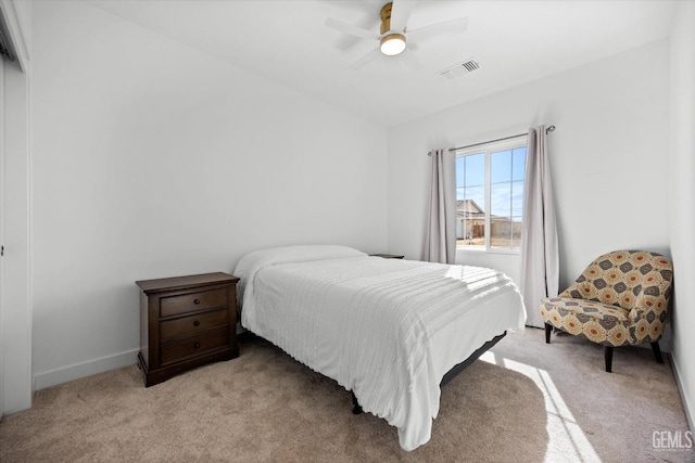 carpeted bedroom featuring ceiling fan