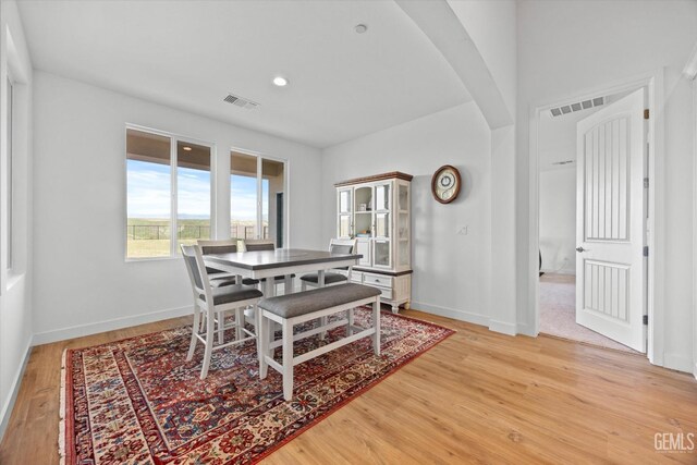 dining room with light hardwood / wood-style flooring