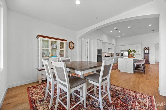 dining room with light wood-type flooring