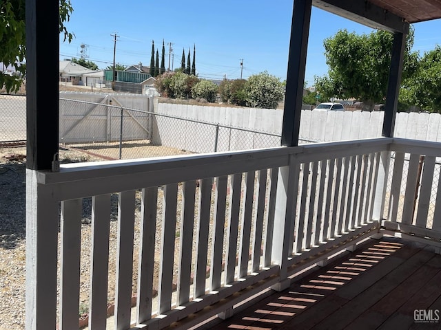 214 Buchanan St, Taft, CA 93268 - wooden terrace featuring a fenced backyard