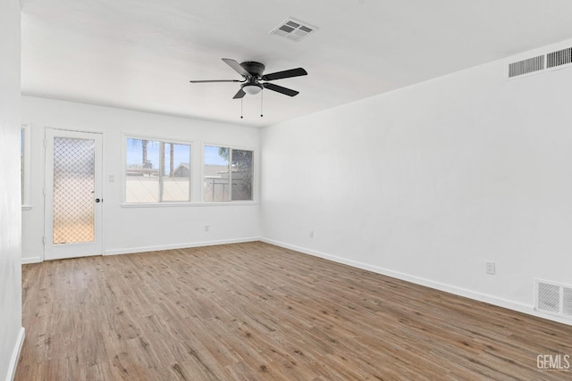 1920 Doolittle Ave, Bakersfield, CA 93304 - unfurnished room featuring ceiling fan, wood finished floors, and baseboards