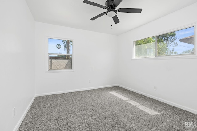 1920 Doolittle Ave, Bakersfield, CA 93304 - carpeted spare room featuring plenty of natural light, baseboards, and ceiling fan