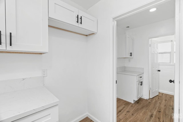 1920 Doolittle Ave, Bakersfield, CA 93304 - washroom featuring light wood-style floors, baseboards, and recessed lighting