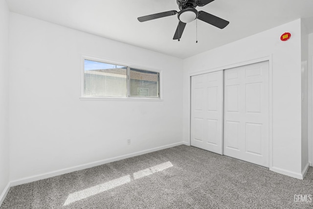 1920 Doolittle Ave, Bakersfield, CA 93304 - unfurnished bedroom with carpet flooring, baseboards, a closet, and a ceiling fan