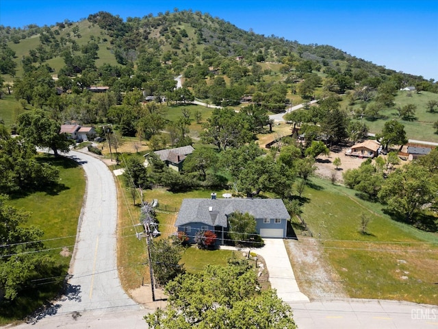 view from above of property featuring a mountain backdrop