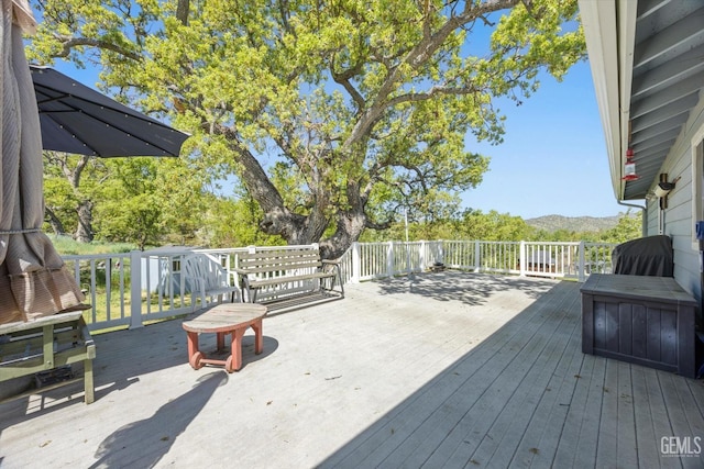 deck featuring a mountain view