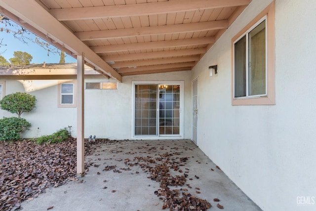 doorway to property featuring a patio