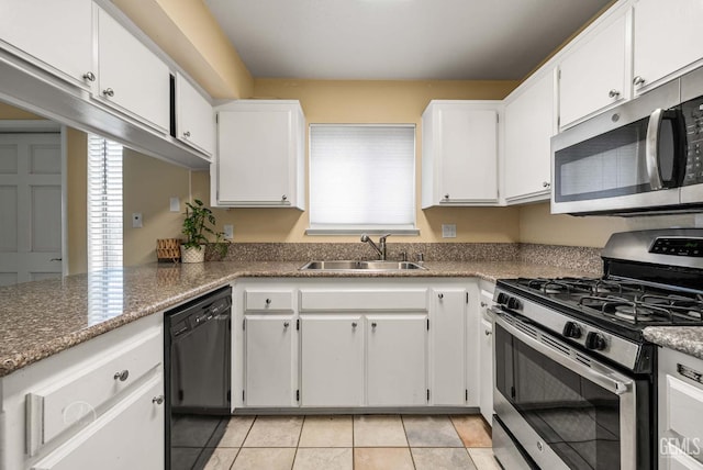 3717 Cypress Glen Blvd, Bakersfield, CA 93309 - kitchen with stainless steel appliances, a sink, white cabinets, and light tile patterned floors