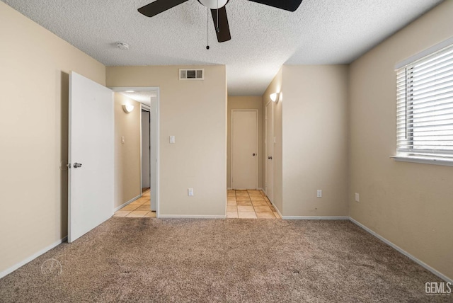 3717 Cypress Glen Blvd, Bakersfield, CA 93309 - unfurnished bedroom featuring light carpet, a textured ceiling, a ceiling fan, and baseboards