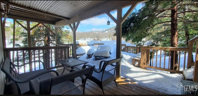 view of snow covered deck