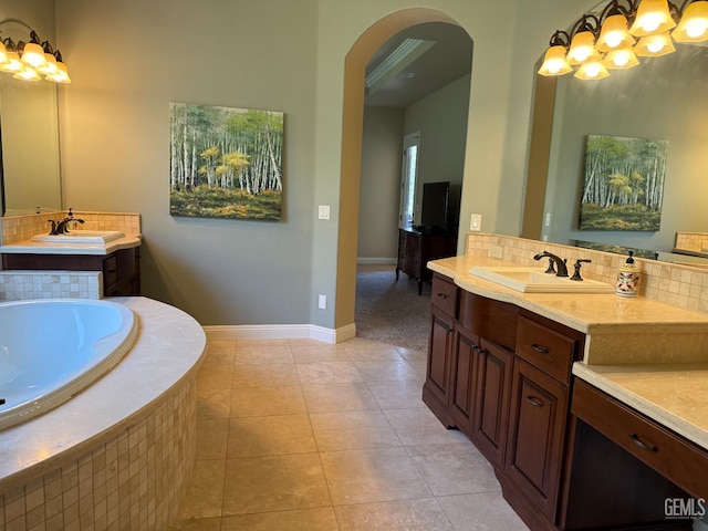 2410 Exton St, Bakersfield, CA 93311 - bathroom featuring backsplash, two vanities, a garden tub, tile patterned flooring, and a chandelier