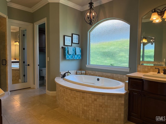 2410 Exton St, Bakersfield, CA 93311 - bathroom featuring a chandelier, a garden tub, tile patterned flooring, vanity, and ornamental molding