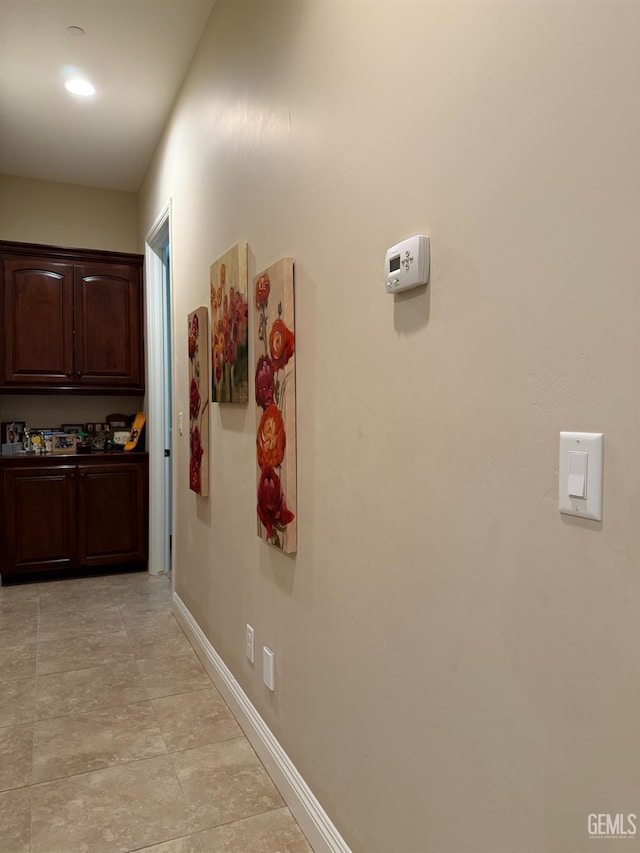 2410 Exton St, Bakersfield, CA 93311 - hallway featuring baseboards