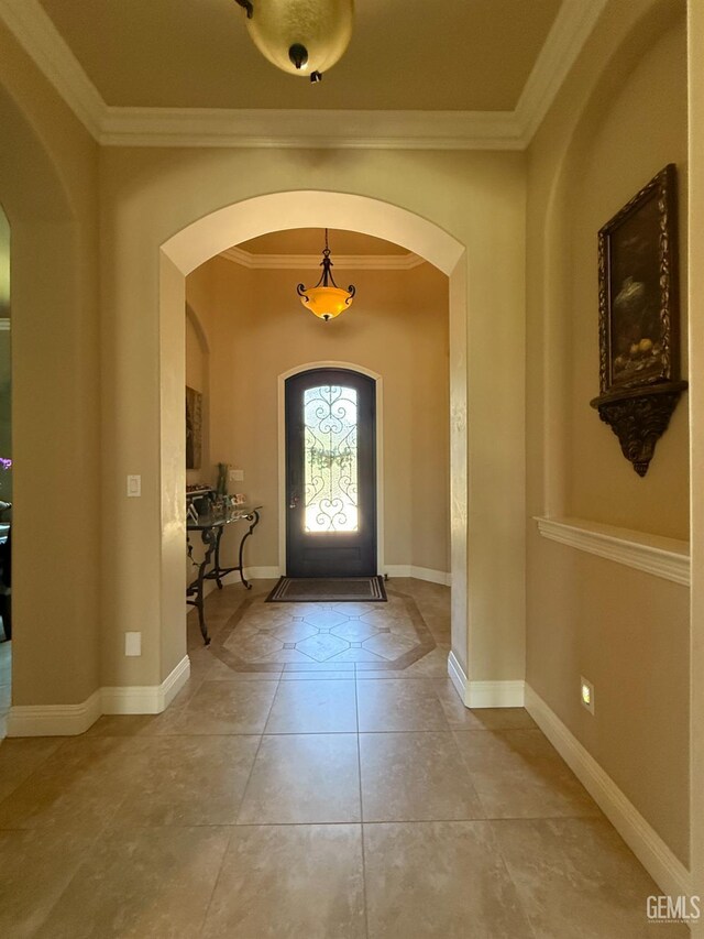 2410 Exton St, Bakersfield, CA 93311 - entrance foyer with arched walkways, ornamental molding, and tile patterned floors
