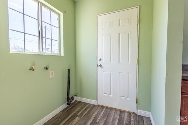 laundry area featuring dark hardwood / wood-style flooring