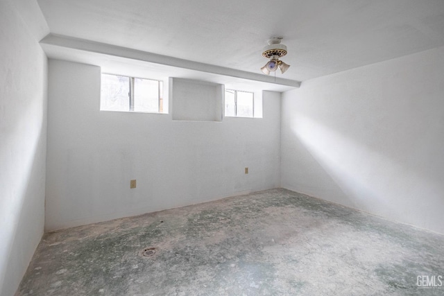 unfurnished room featuring concrete floors