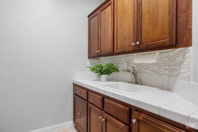 laundry area with sink