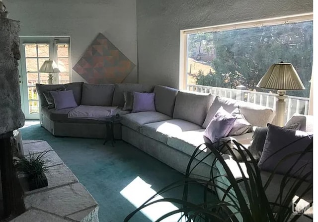 24551 Pueblo Ct, Tehachapi, CA 93561 - living area with carpet and a textured wall