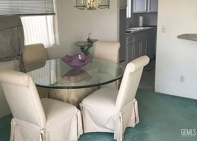 24551 Pueblo Ct, Tehachapi, CA 93561 - carpeted dining space with a chandelier