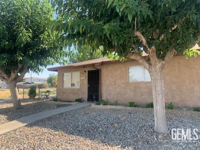 305 Monroe St Unit C, Taft, CA 93268 - view of front of home featuring stucco siding