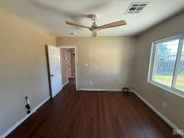 3820 Apache Ave, Bakersfield, CA 93309 - spare room with dark wood-type flooring and a ceiling fan