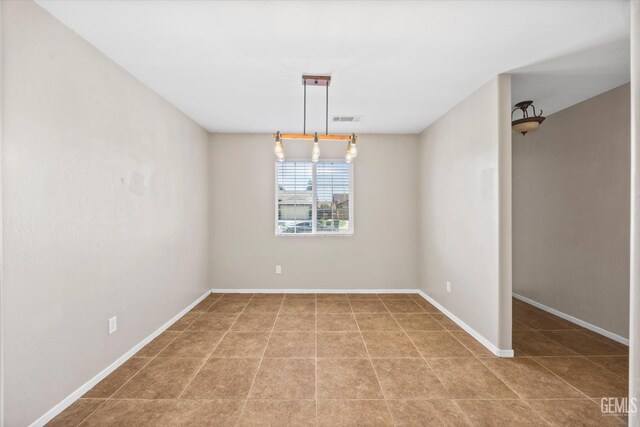 11602 Trabancos Dr, Bakersfield, CA 93311 - spare room with light tile patterned flooring and baseboards