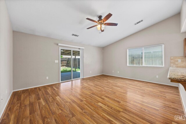 11602 Trabancos Dr, Bakersfield, CA 93311 - spare room featuring lofted ceiling, ceiling fan, and light wood-style floors