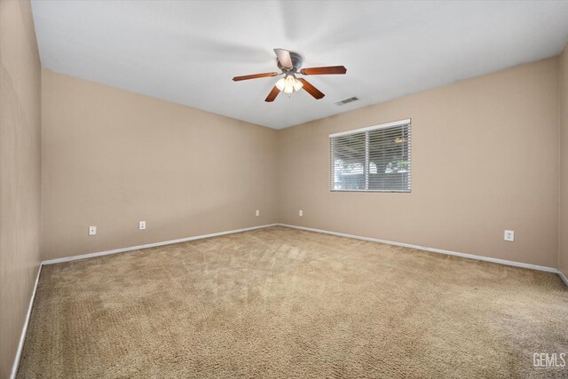 11602 Trabancos Dr, Bakersfield, CA 93311 - spare room featuring carpet floors and a ceiling fan