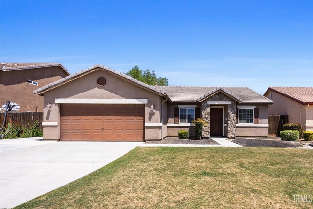 11602 Trabancos Dr, Bakersfield, CA 93311 - single story home featuring a garage, driveway, stucco siding, and a tiled roof