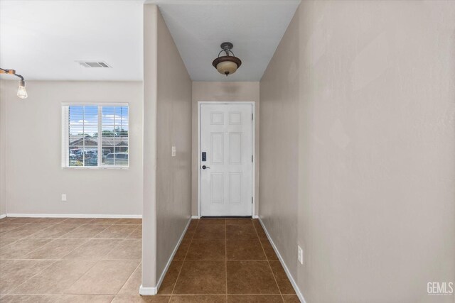 11602 Trabancos Dr, Bakersfield, CA 93311 - doorway featuring tile patterned flooring and baseboards