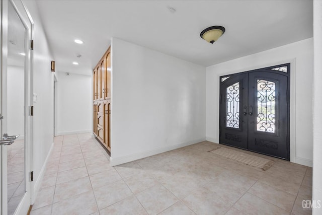 11717 Old Town Rd, Bakersfield, CA 93312 - entryway featuring french doors, light tile patterned floors, and recessed lighting