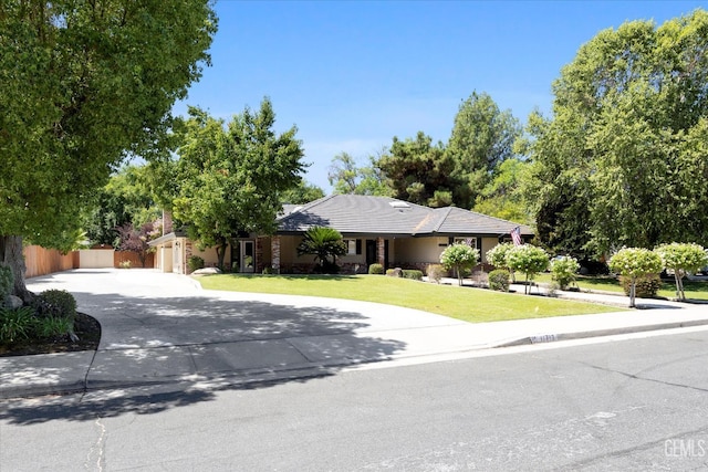 11717 Old Town Rd, Bakersfield, CA 93312 - view of front of property featuring curved driveway, a tiled roof, and a garage