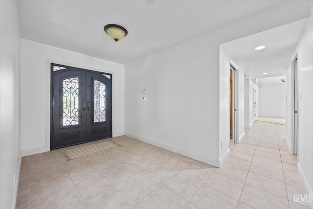 11717 Old Town Rd, Bakersfield, CA 93312 - foyer with french doors and light tile patterned floors