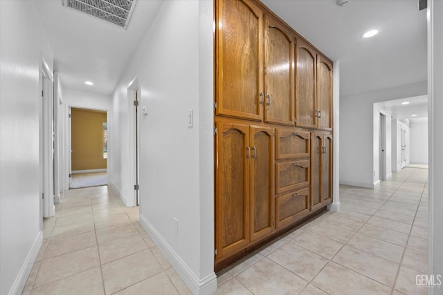 11717 Old Town Rd, Bakersfield, CA 93312 - corridor featuring light tile patterned floors and recessed lighting
